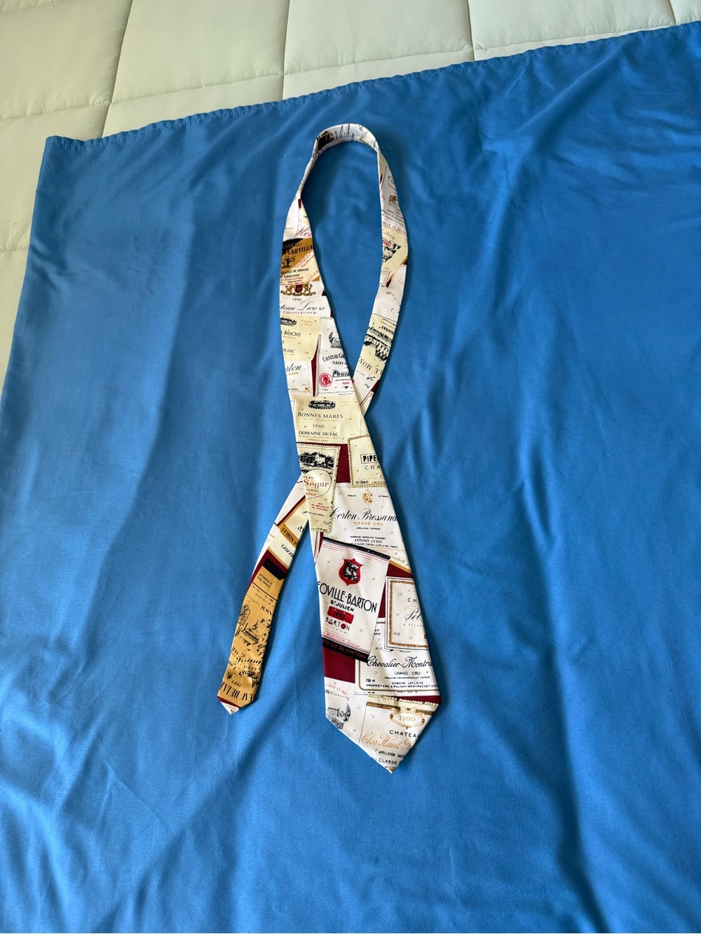 Magnificent Mouchoiss Cream Tie with Burgundy and Gold Wine Label Print
